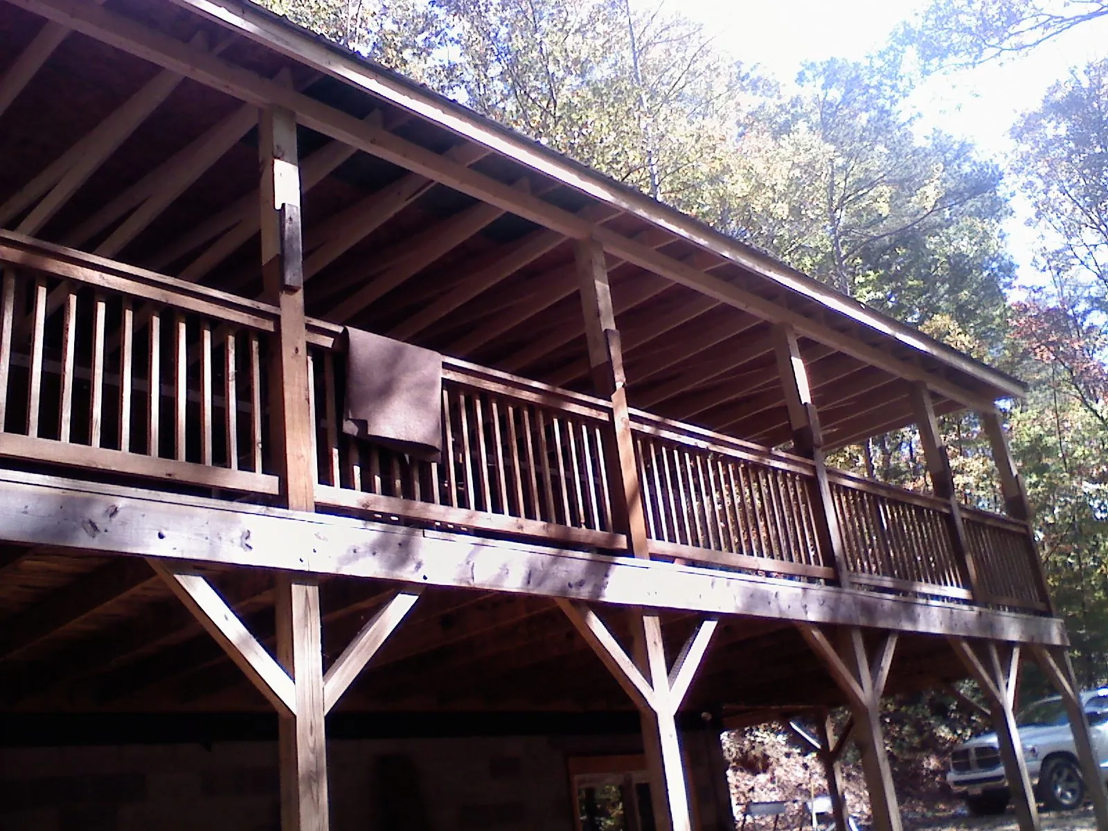 Timber framing under a new elevated porch and deck — Roof Leak Repair in Placentia by Roofing Brothers
